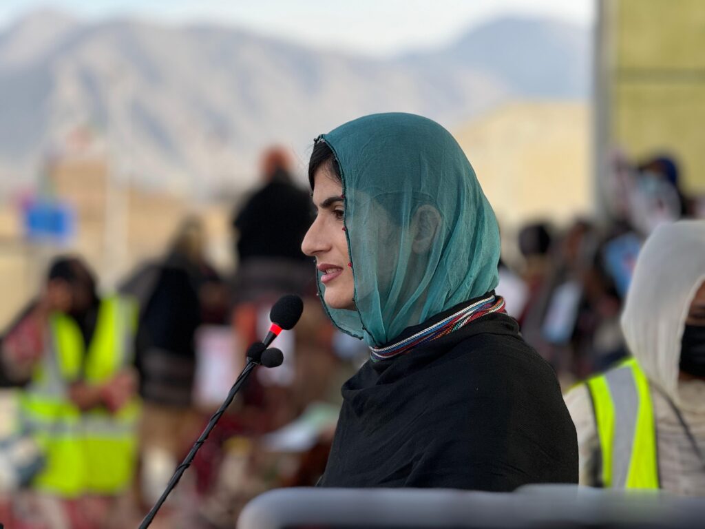 Sammi Deen Baloch speaking at a gathering