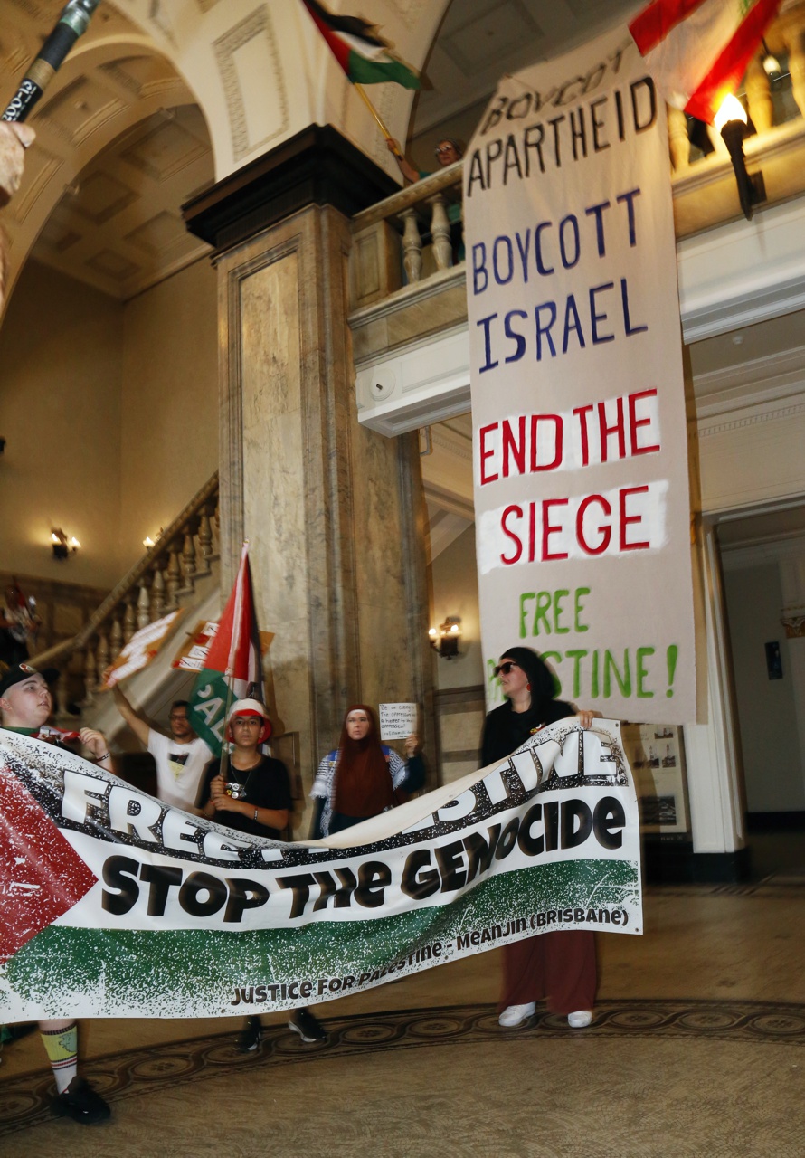 Banner drop in City Hall, Magan-djin/Brisbane, November 10