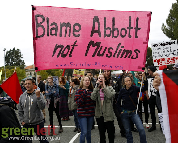 Protesters holding banner