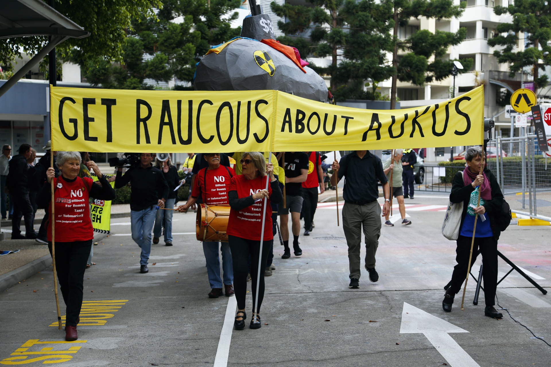 'Get raucus about AUKUS' - marching against war