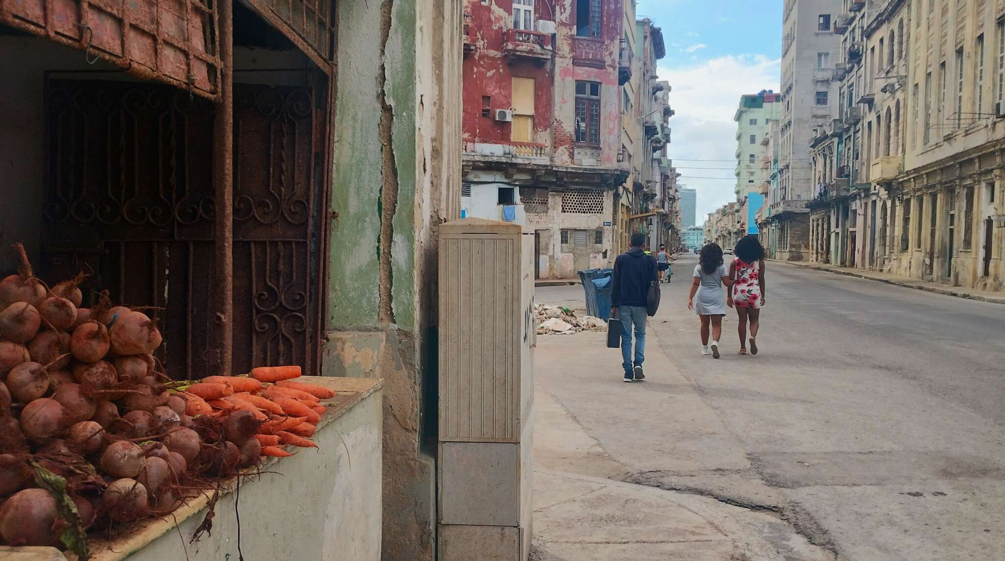 Vegetables for sale in a largely empty street in the Vedado area of Havana, Cuba.