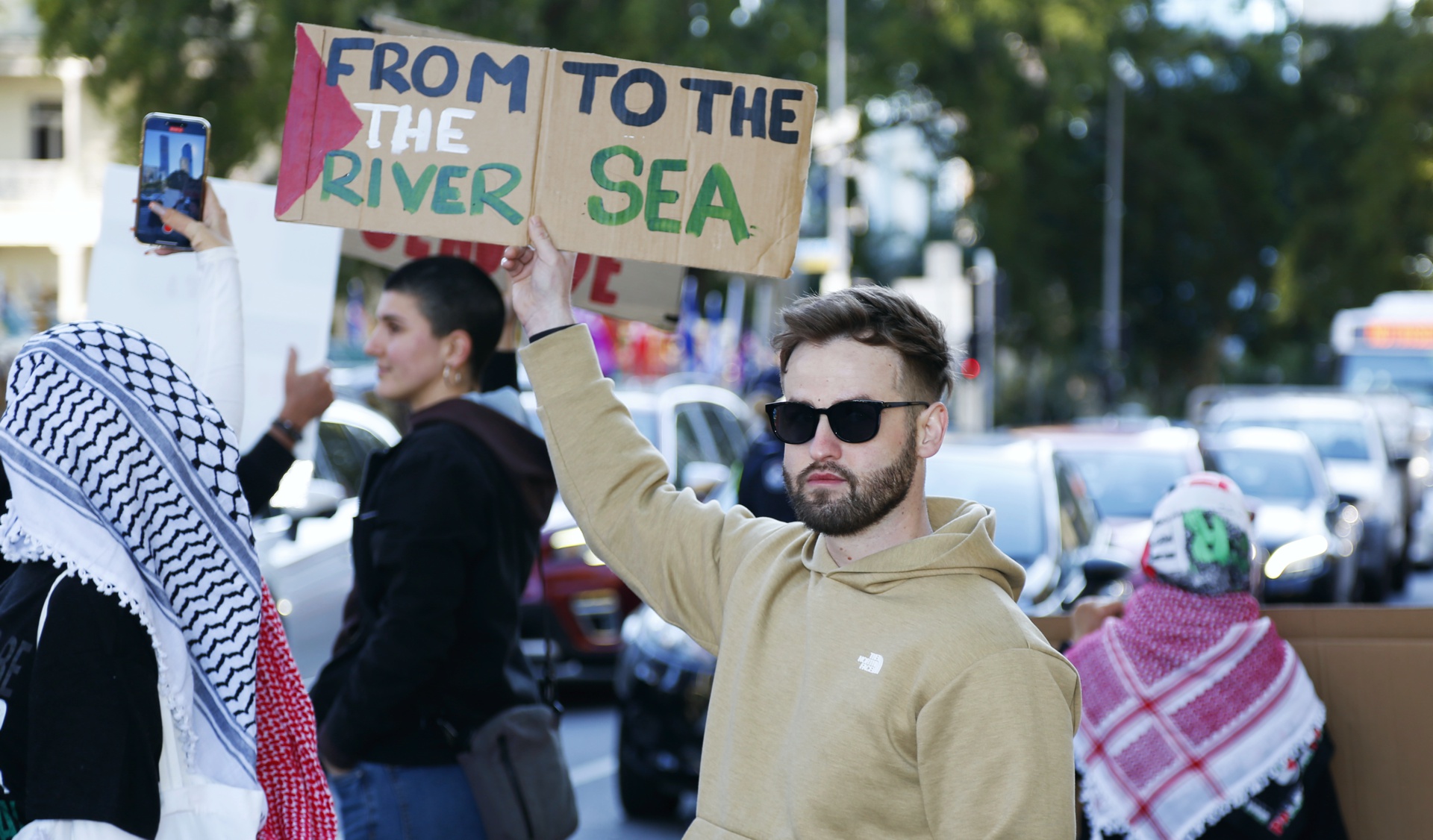 Protesters stepped onto the road outside state parliament, Magan-djin/Brisbane, June 11