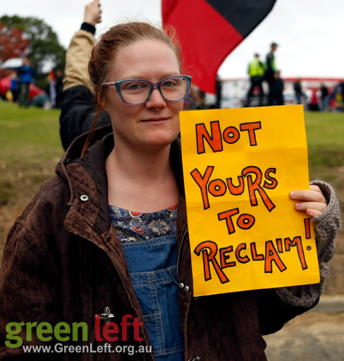 Protester holding sign