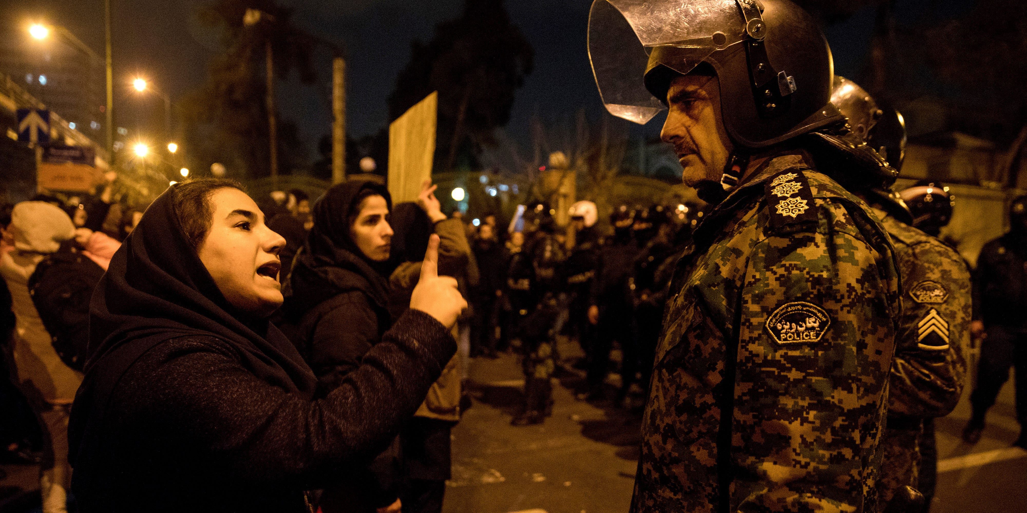 P16 Student And Cop At Ukraine Plane Vigil Outside Amri Kabir University Tehran Jan 11 2020 