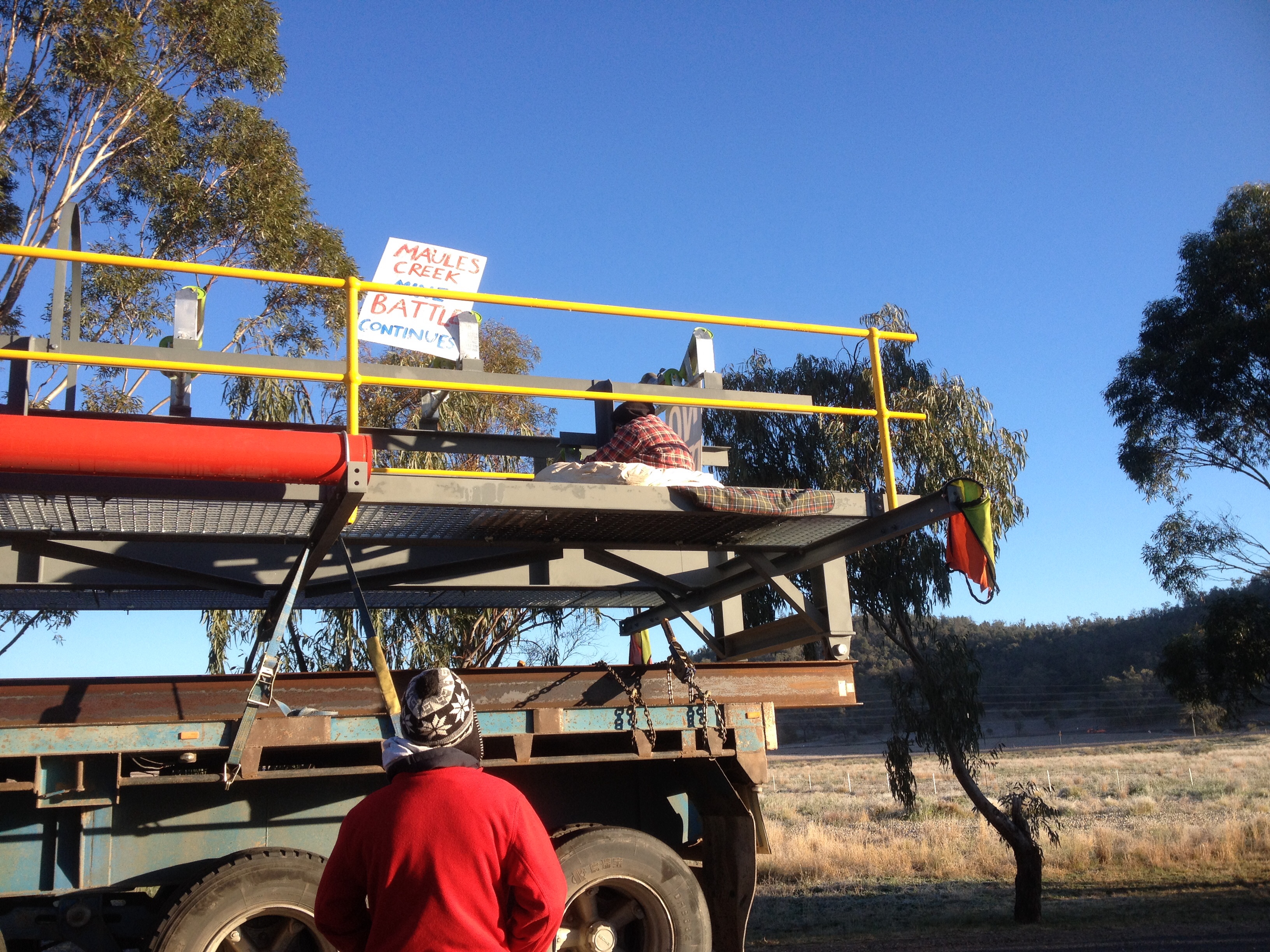 Another two protesters have locked themselves onto truck equipment intended for use by Idemitsu's Boggabri coal mine expansion.