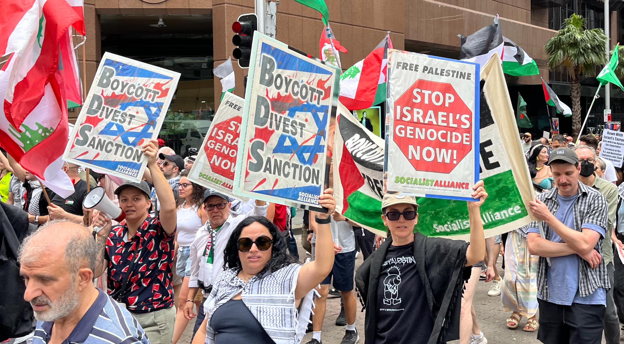 Socialist Alliance placards on Gadigal Country/Sydney, November 3