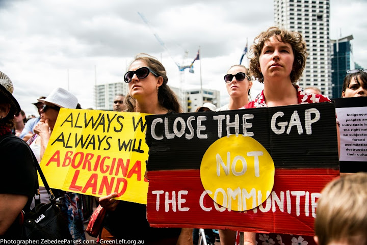 Close the gap, not the communities placard.