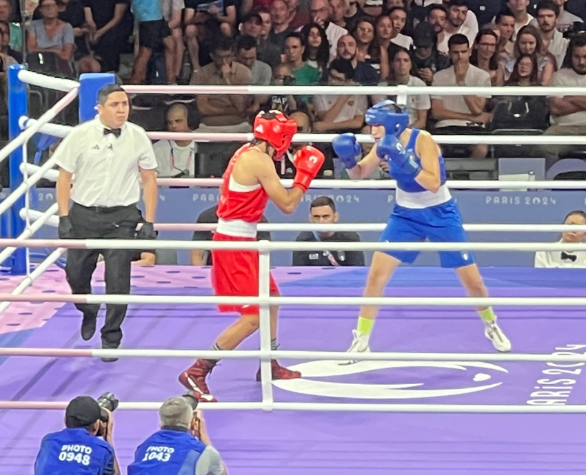 Two women boxing in an Olympic bout