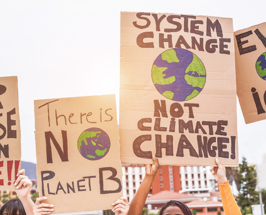 protesters holding signs