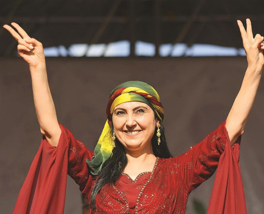 woman making peace signs with both hands