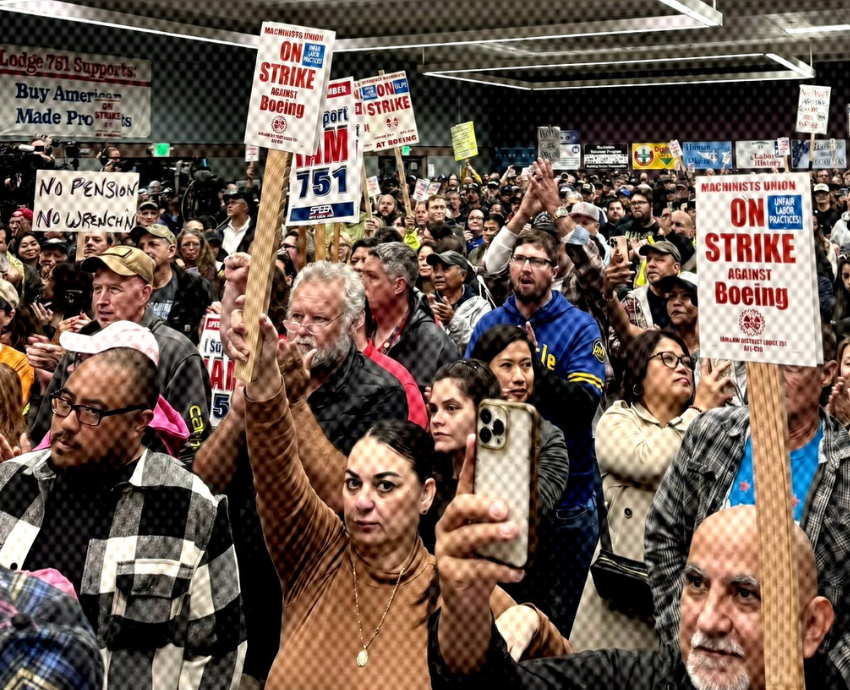 striking workers at a meeting