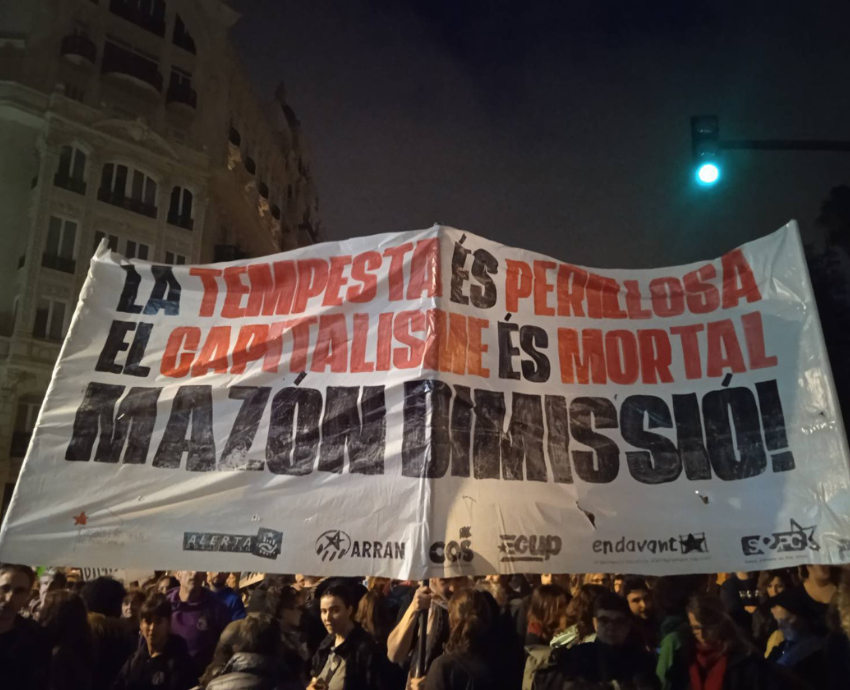 Protesters carrying a banner