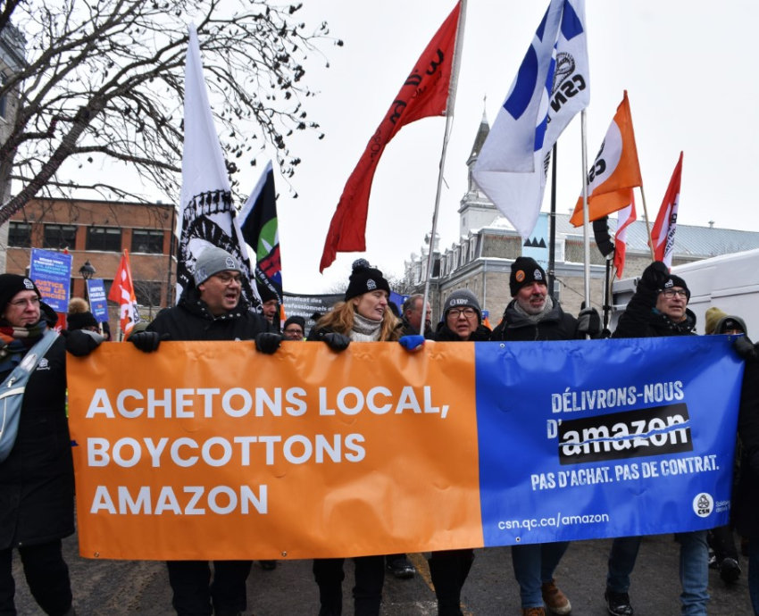 Protesters carrying a banner