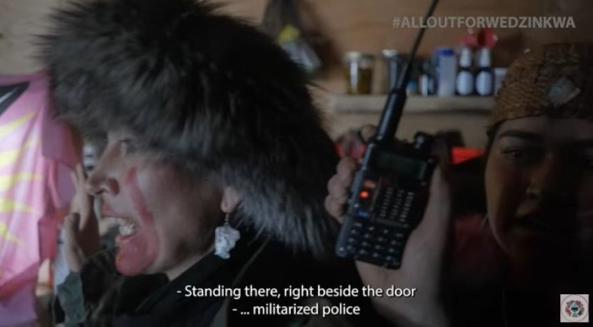 woman speaking on a radio