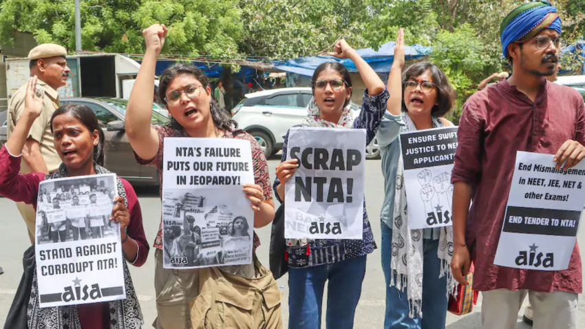 protesters holding signs