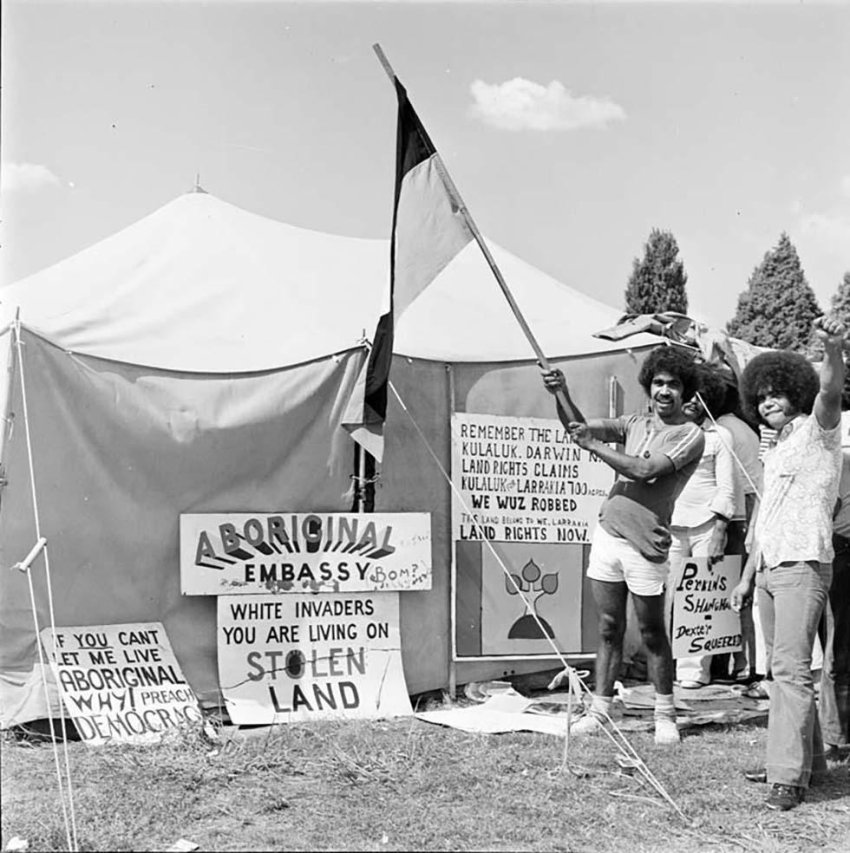Waving the Aboriginal flag at the Aboriginal Tent Embassy 1974