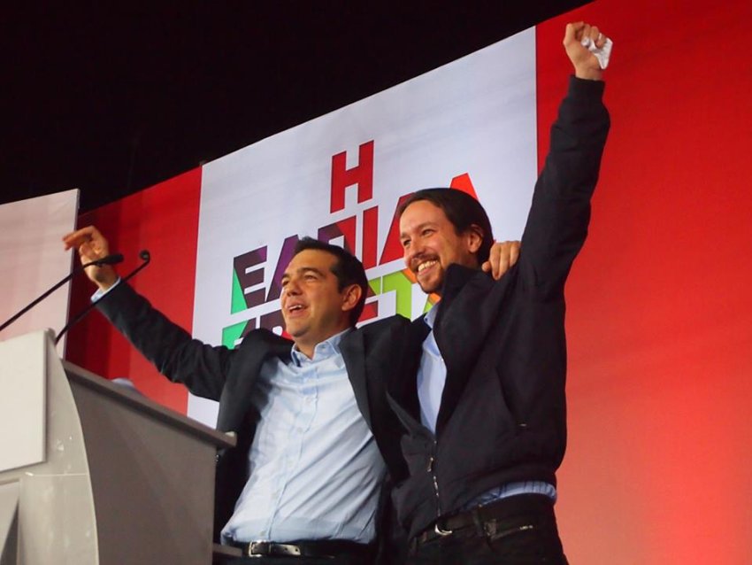 Alexis Tsiprad on stage with Pablo Iglesias.