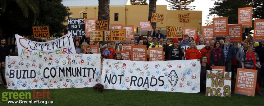 Build Community Not Roads banner, No Roe 8 protest.