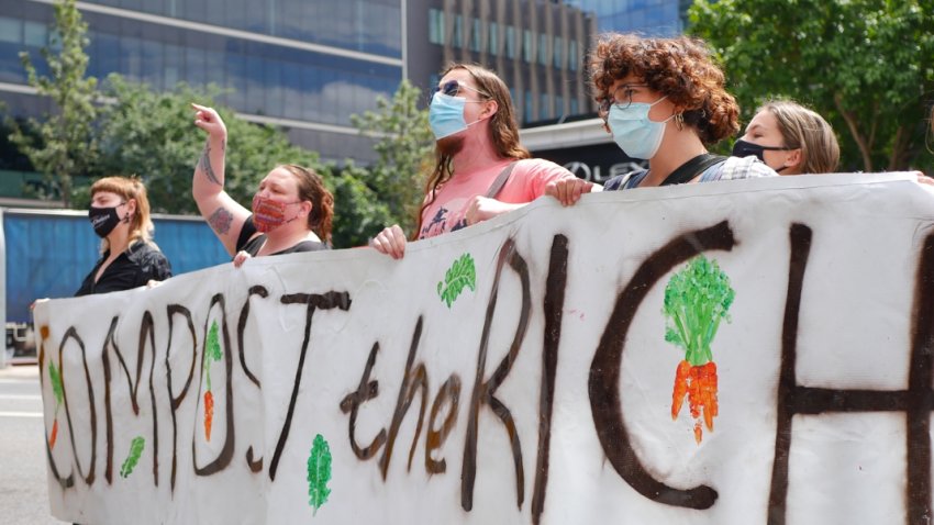 Compost the rich: September 30 action outside Bluebird Property.