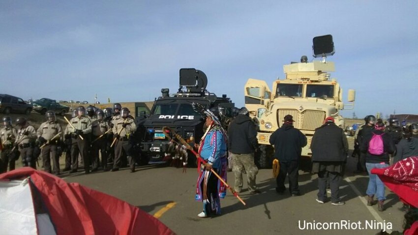 Water protectors and police in a stand off at Cannonball in North Dakota.