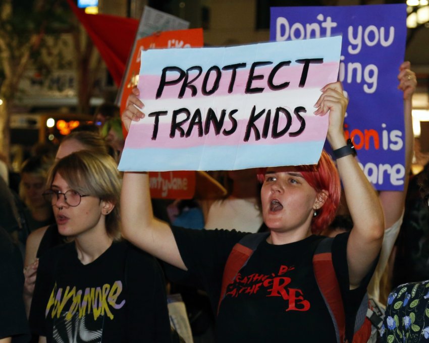 'Protect trans kids' sign at the rally