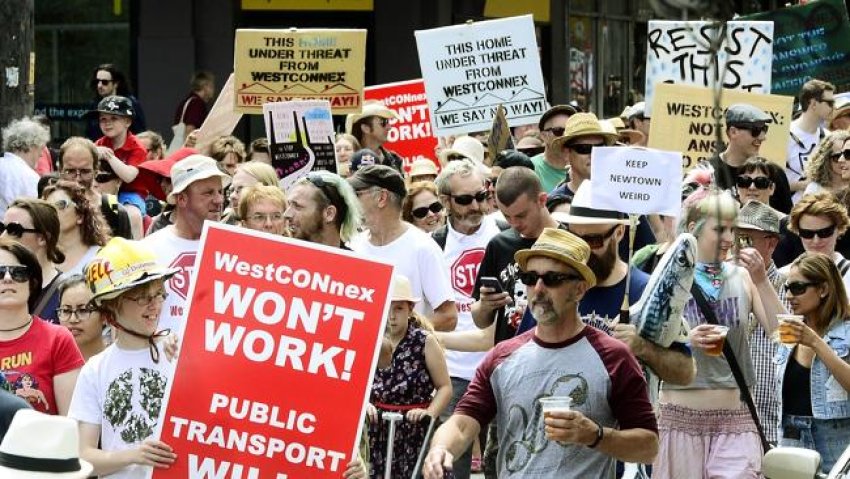 Desmonstrators march through Sydney's streets on February 1 to protest the WestConnex motorway.