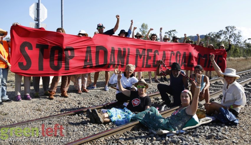 Protesters with banner