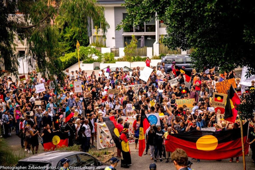 Protesters marching against forced closure of Aboriginal communites.