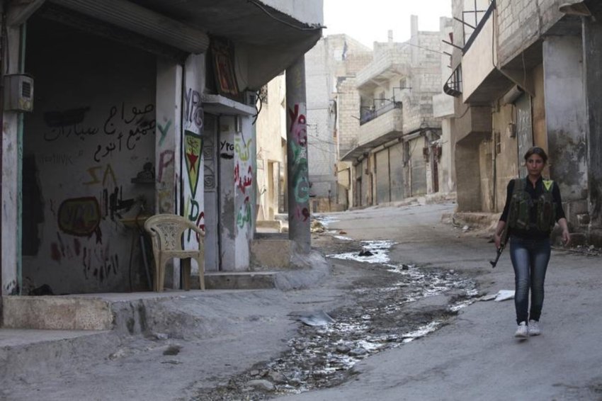 Kurdish fighter in Aleppo's Sheikh Maqsoud neighbourhood.