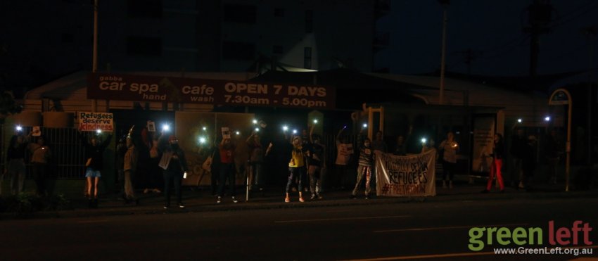 Candlelight vigil at the end of the action