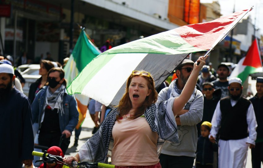 Waving the Palestinian flag