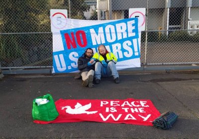 Greg Rolles and Shane Anders locked to Lockheed Martin's main gates on August 11, 2016.