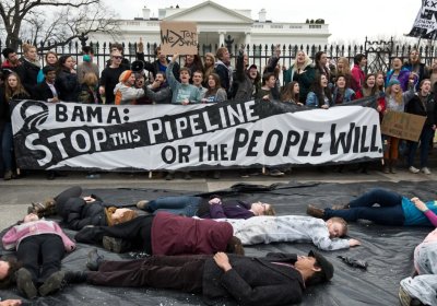 Students protest against the proposed Keystone XL pipeline in front of the White House on March 2.