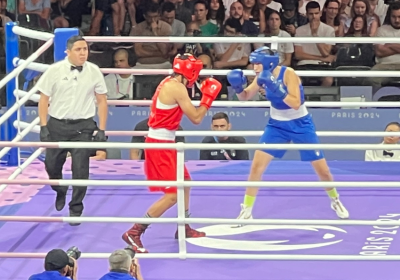 Two women boxing in an Olympic bout