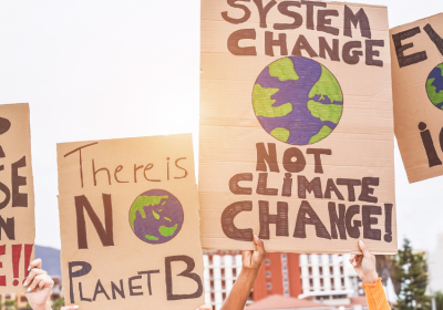 protesters holding signs