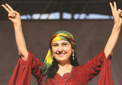 woman making peace signs with both hands