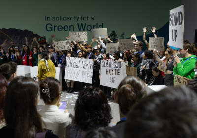 Protesters with banner and signs