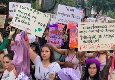 women marching with signs