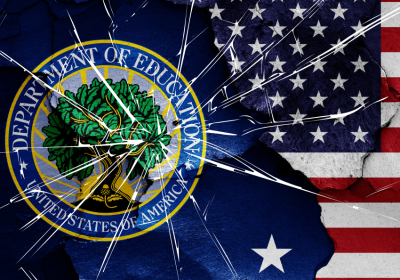 DOE logo and US flag under smashed glass