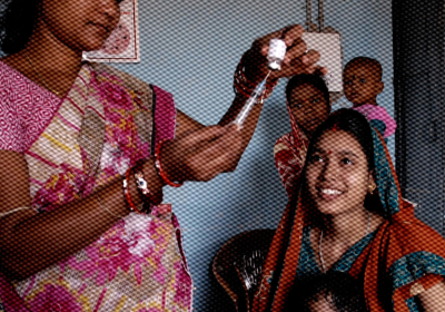 Healthworker prepares a vaccination injection