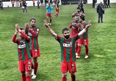 Players from the football club Amedspor celebrate after a win.