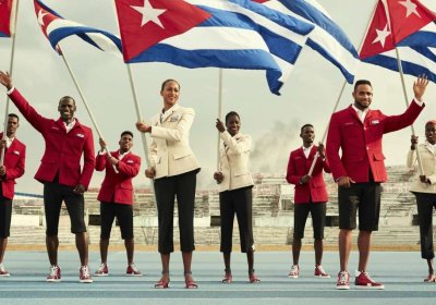 Cuban athletes model the Olympic ceremonial outfits Christian Louboutin helped design.