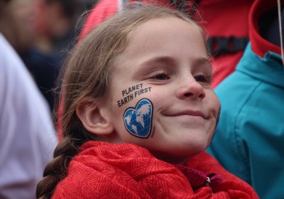 Child in the climate justice march in Bonn on November 4. Photo: John Englart, Takver/Flickr.