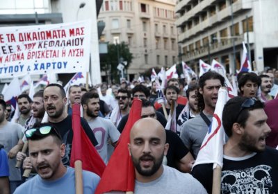 Public sector workers strike against the deal, July 15.