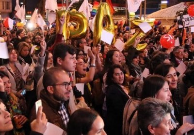 Colombians in Bogota watch the announcement