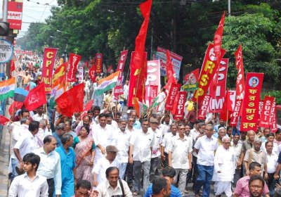 Workers march in a general strike protest in India on September 2 2013. 