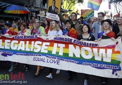 Legalise It Now banner at the front of the Marriage Equality march in Brisbane.