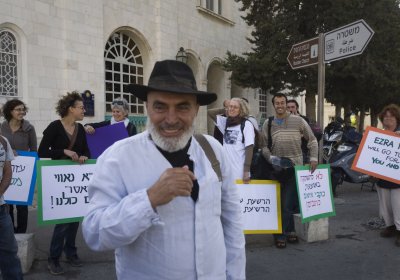 Supporters stand with Ezra Nawi outside an Israeli prison where he served a one-month sentence, May 23, 2010.