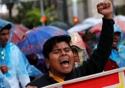 Protesters march against the education reform in Mexico City.