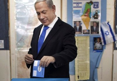 Israeli Prime Minister Benjamin Netanyahu casts his vote.